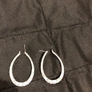 Silver loop earring, I think these were Lia Sophia